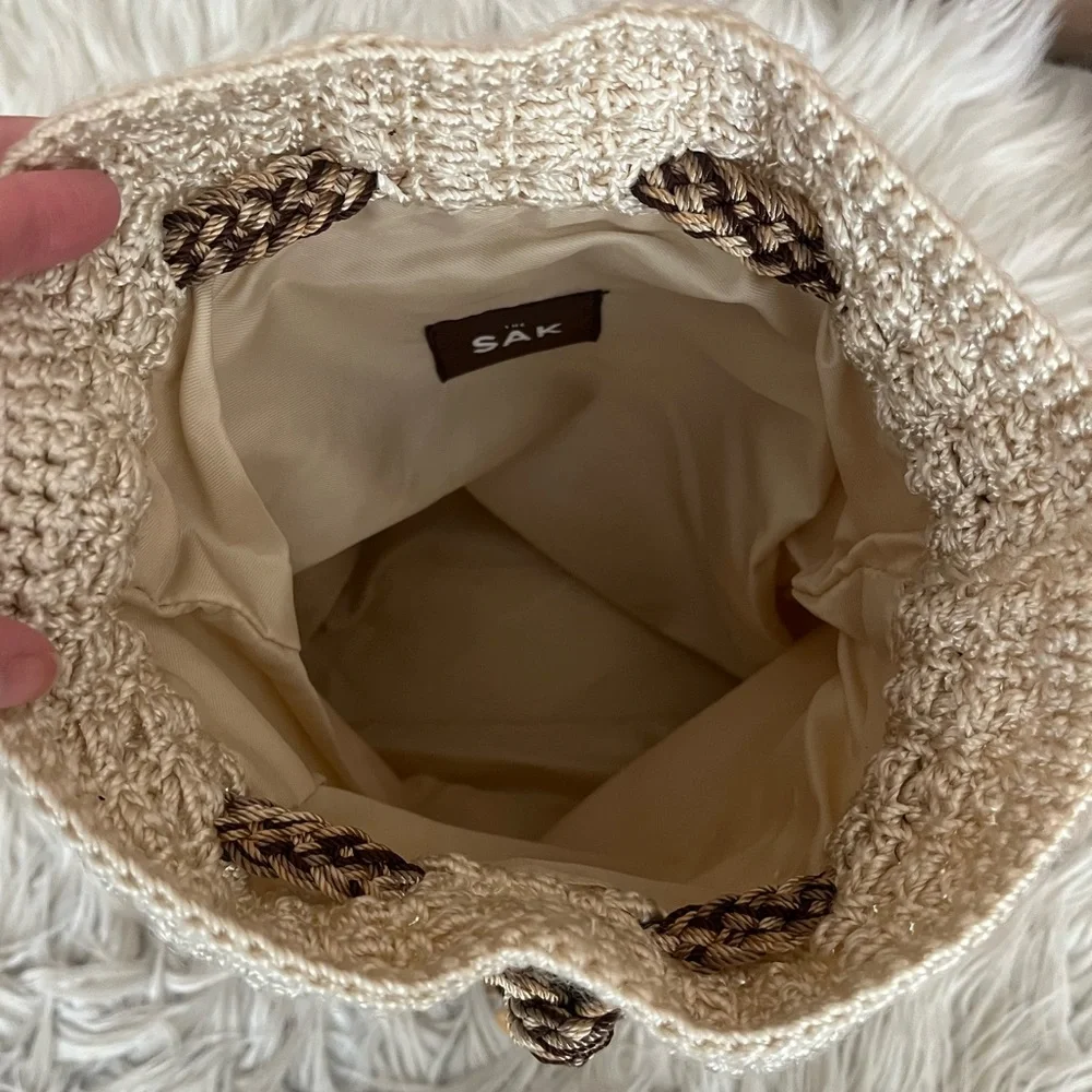 {The SAK} Crochet Drawstring Backpack Purse in Ivory